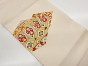 塩瀬金彩抽象に菱・花葉・唐草模様名古屋帯
